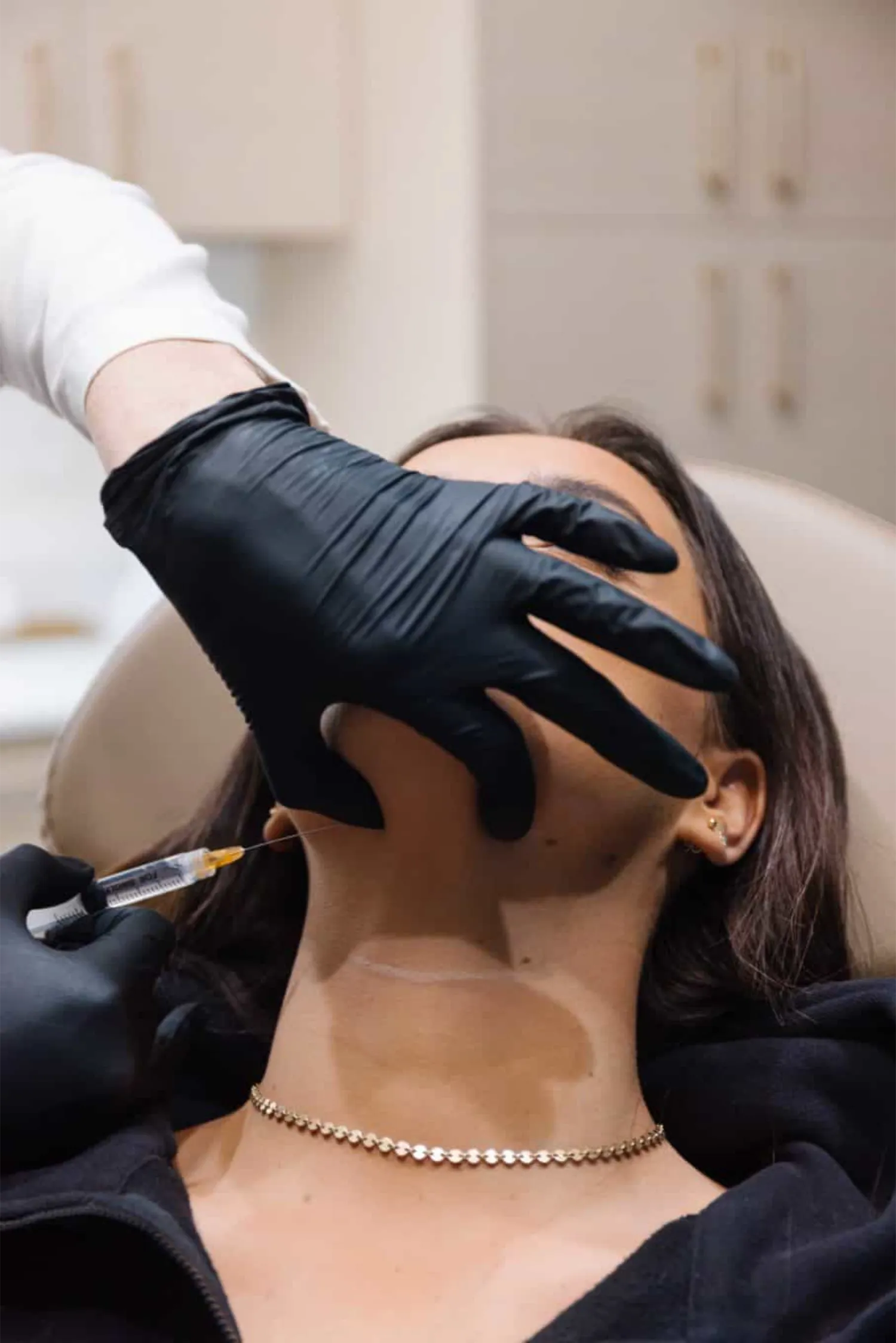 A woman take Kybella service in Draper, UT